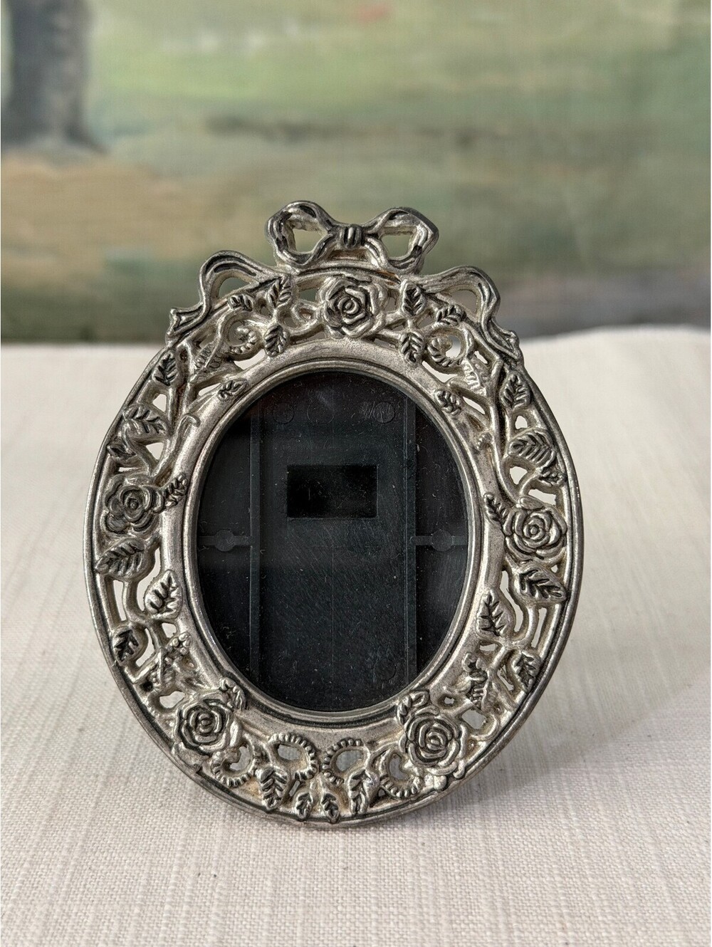 Vintage Silver Tone Oval Photo Frame with Floral and Bow Design
